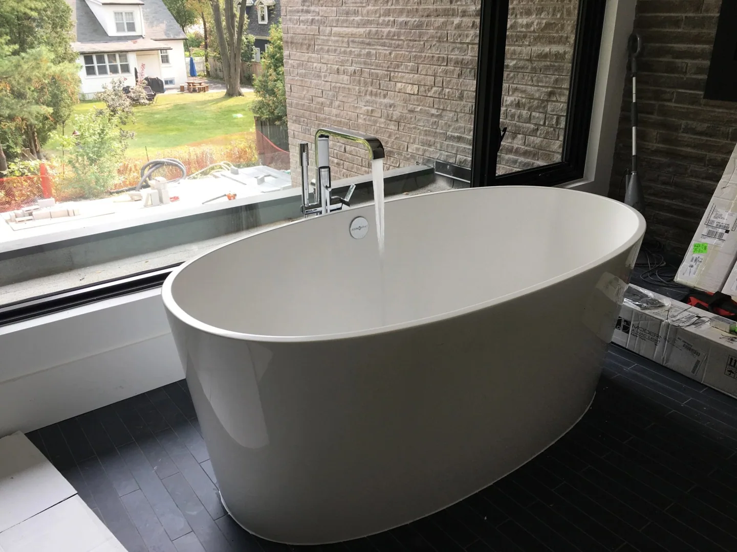 Freestanding bathtub and tap from the Sam the Plumber project gallery
